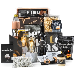 Wijn kerstpakketten met een fles wijn en heerlijke snacks